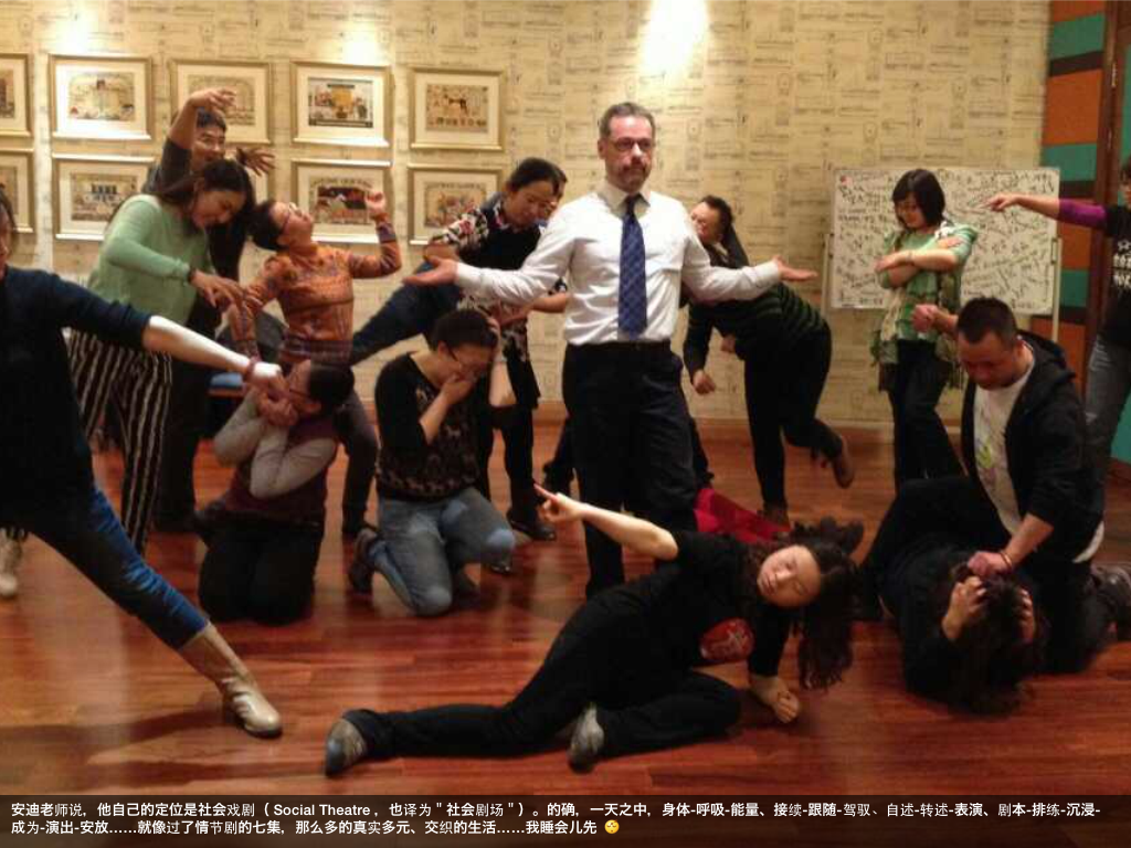 Andy taking part in a Social Theatre workshop in Taiyuan, China, 2014, with Chinese text printed on the image