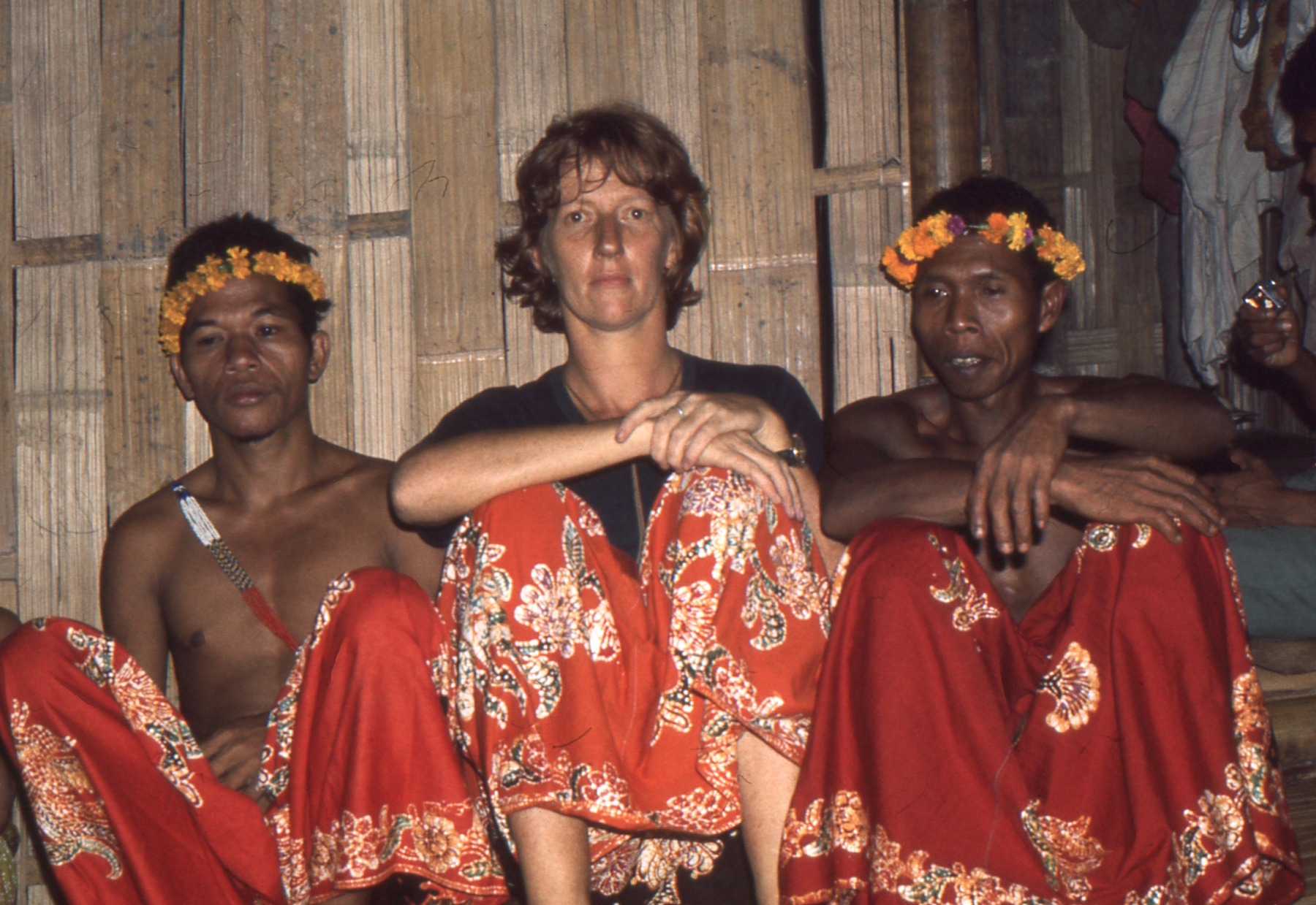 Sue sitting with Temiar men after a discussion about dreaming in Kelantan in the 1970s