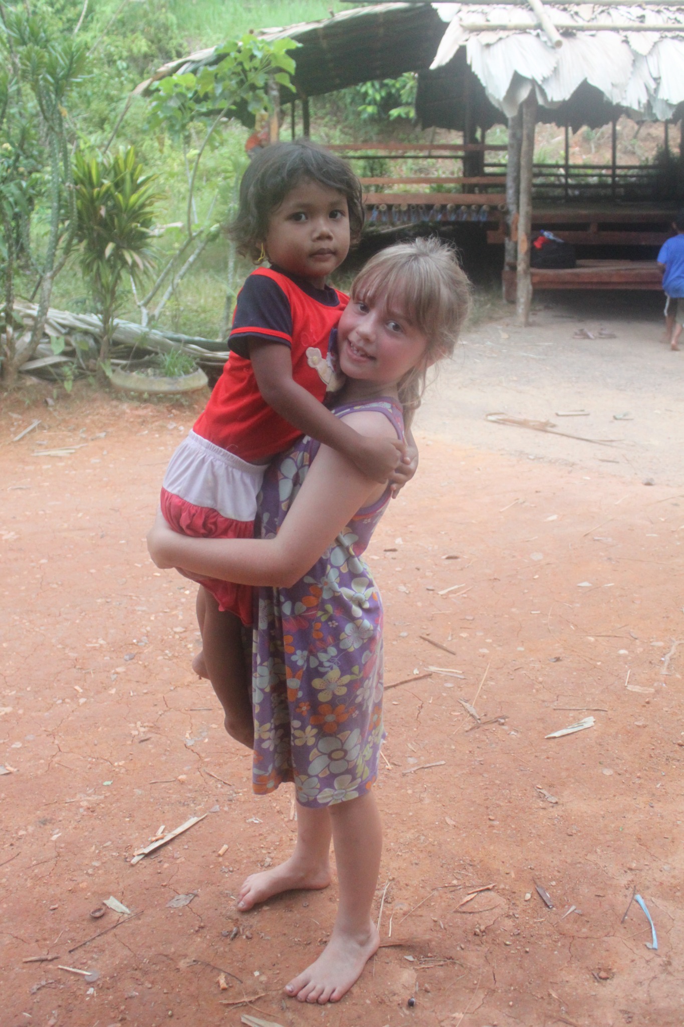 Andy’s daughter with a Temiar child in Kelantan