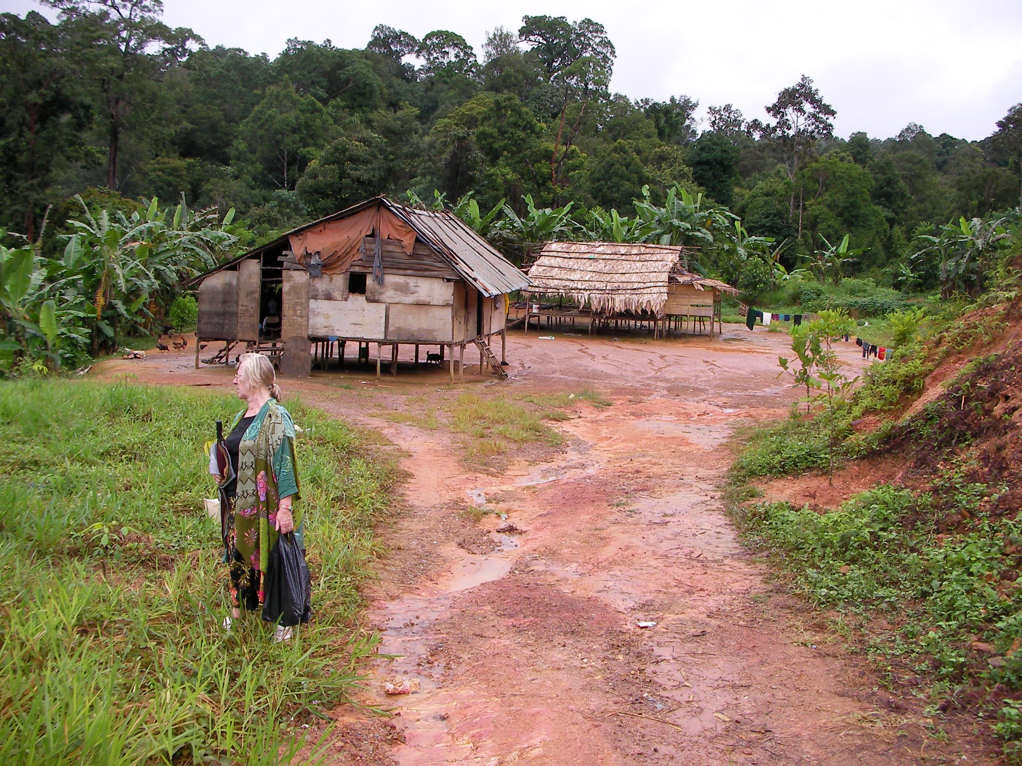 Sue outside a Temiar village before leaving Kelantan