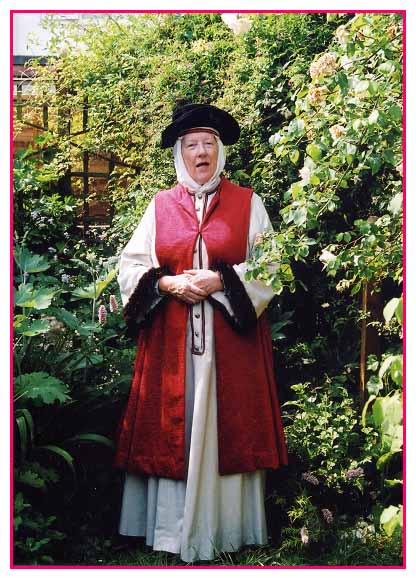 Sue in costume performing Wife of Bath outdoors